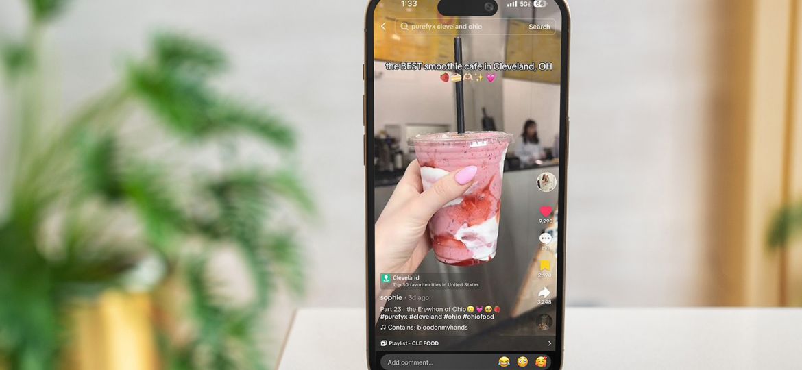 phone on cafe counter with viral post of Cleveland influncer's smoothie post