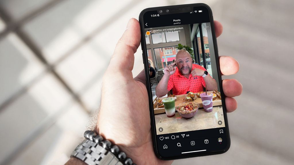 man holding a cell phone with PureFyx Instagram post featuring Snipping for Dom