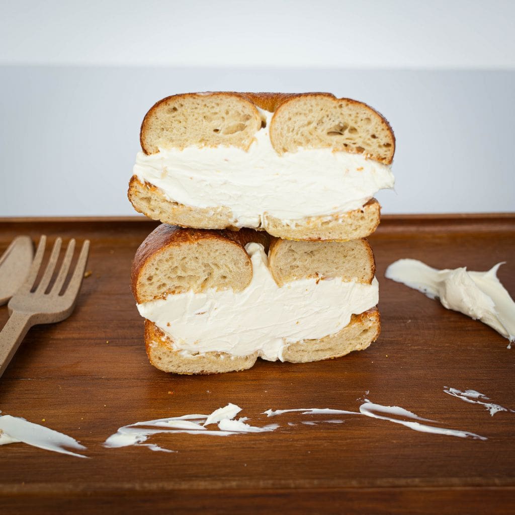 delicious bagel with cream cheese stacked